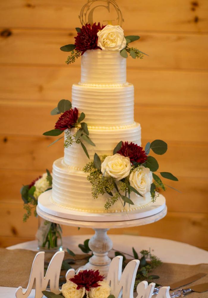 Classic White Buttercream Wedding Cake with Fresh Flowers